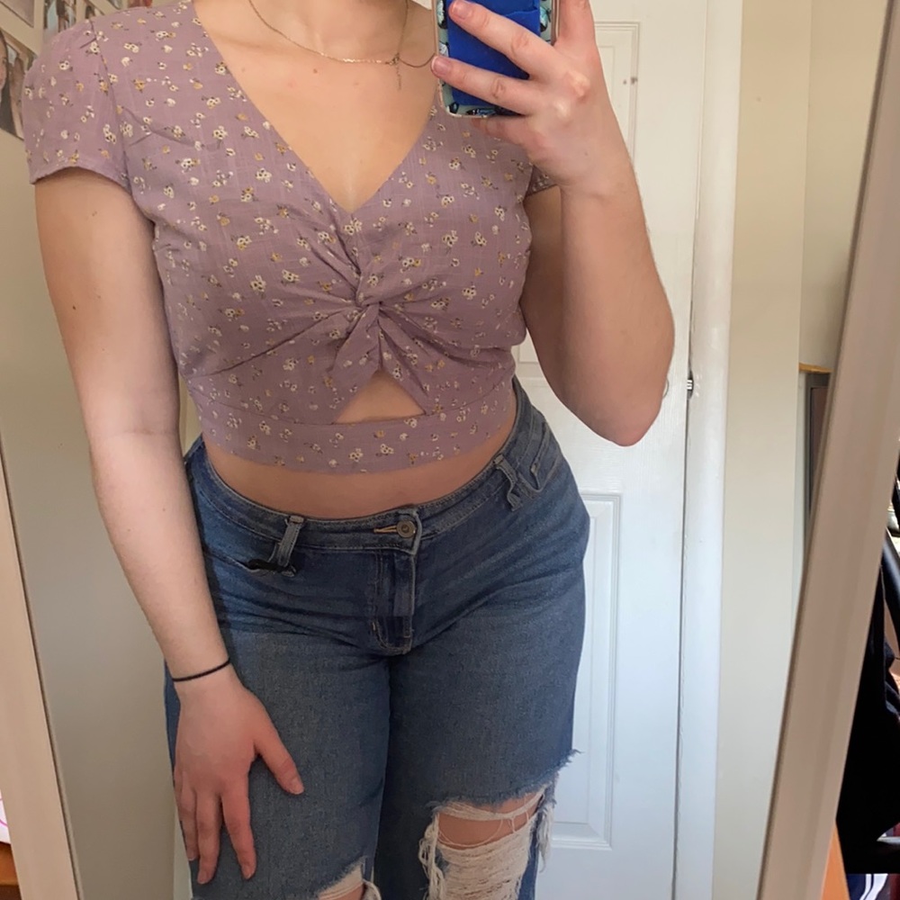 Adorable soft purple top, yellow and white wildflower print.